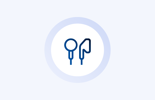 Icon of a magnifying glass and a paperclip inside a blue gradient circle on a light background.